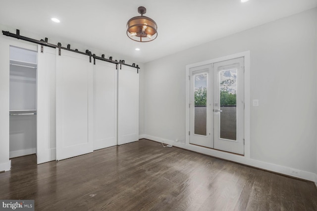 2015 Flagler Pl NW Unit 2, Washington, DC 20001 - unfurnished dining area with a barn door, french doors, dark wood-style flooring, and recessed lighting