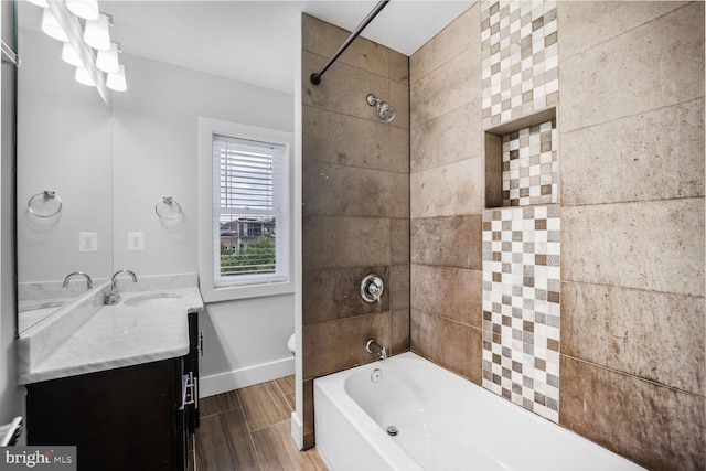 2015 Flagler Pl NW Unit 2, Washington, DC 20001 - full bath with vanity, shower / bath combination, and wood finished floors