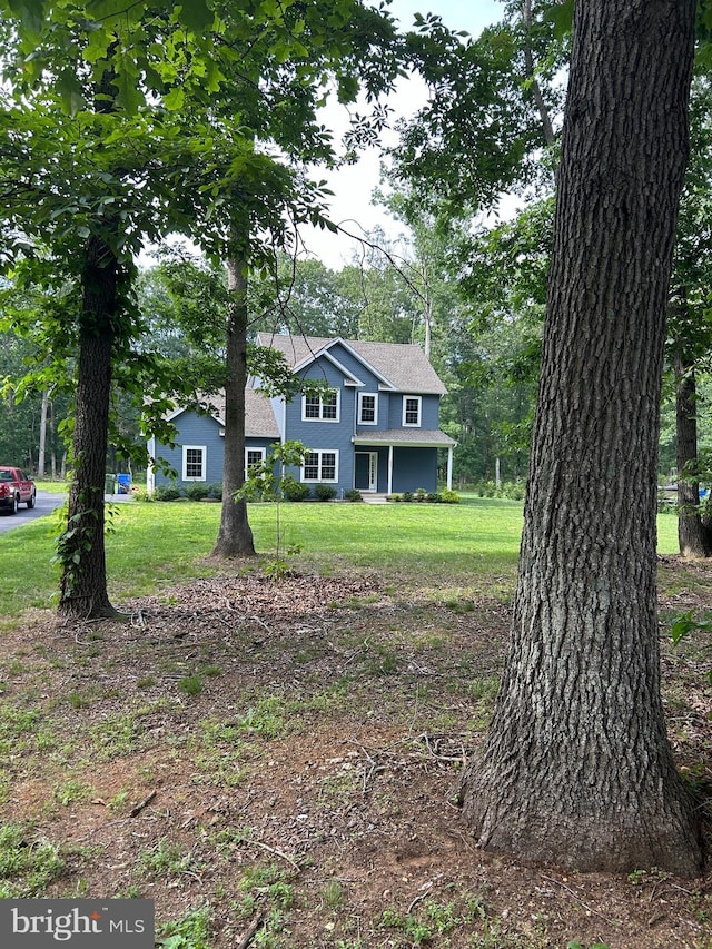 655 Morris Ave, Newfield, NJ 08344 - traditional-style house featuring a front lawn