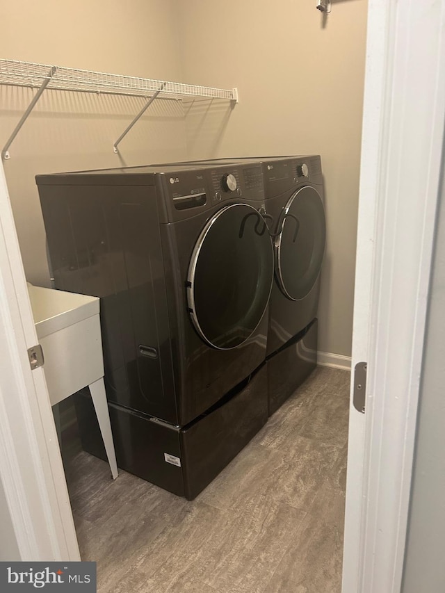 655 Morris Ave, Newfield, NJ 08344 - washroom featuring washer and clothes dryer and wood finished floors