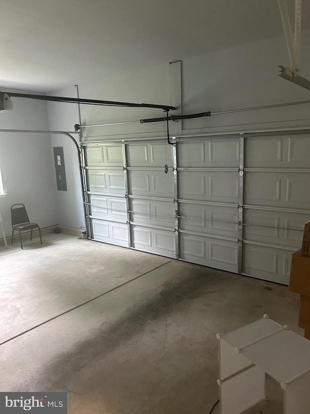 655 Morris Ave, Newfield, NJ 08344 - garage with electric panel and a garage door opener