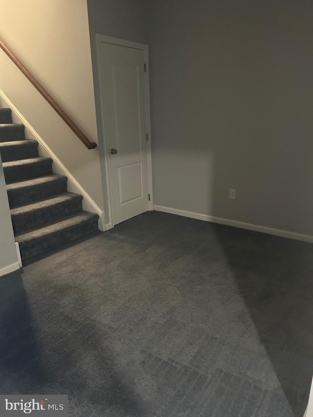 655 Morris Ave, Newfield, NJ 08344 - empty room featuring stairs and dark carpet