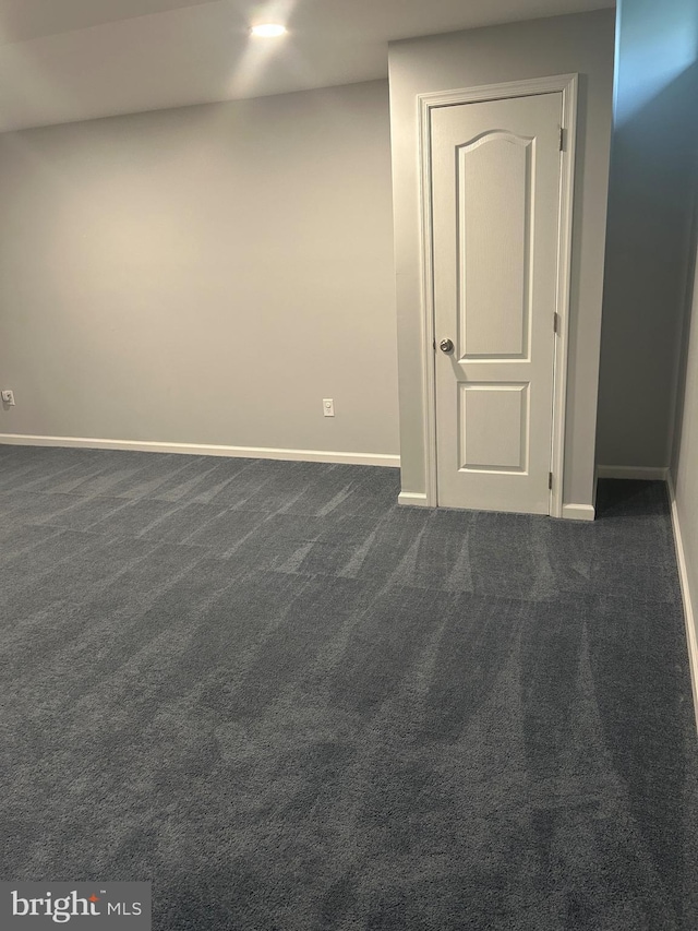655 Morris Ave, Newfield, NJ 08344 - unfurnished room featuring baseboards and dark carpet