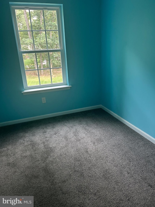 655 Morris Ave, Newfield, NJ 08344 - carpeted empty room featuring baseboards
