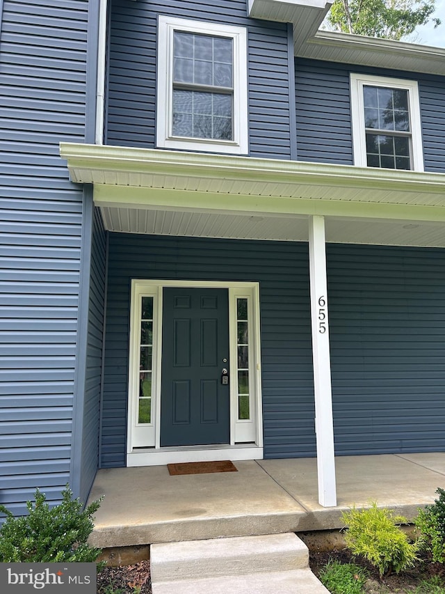 655 Morris Ave, Newfield, NJ 08344 - doorway to property featuring a porch