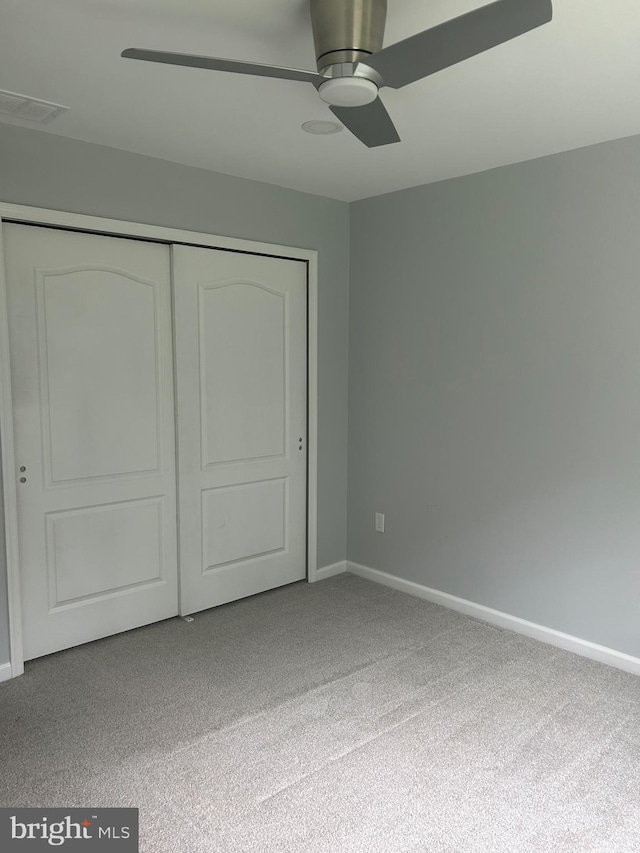 655 Morris Ave, Newfield, NJ 08344 - unfurnished bedroom with carpet, a closet, and ceiling fan
