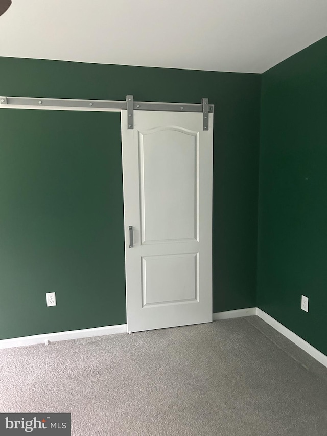 655 Morris Ave, Newfield, NJ 08344 - carpeted spare room with baseboards
