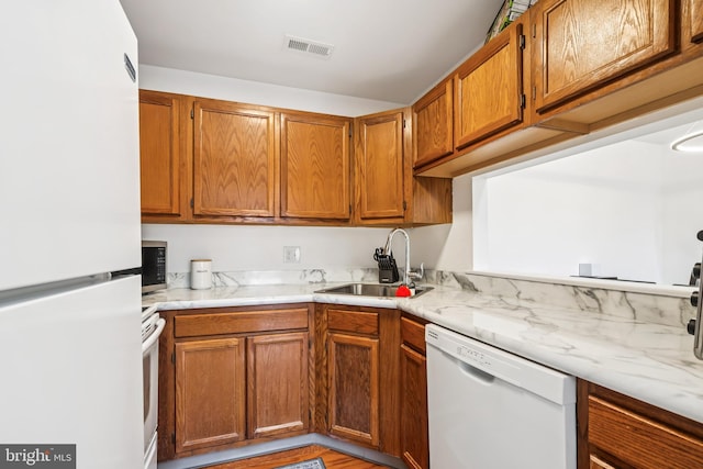5116 Aberdeen Dr, Mount Laurel, NJ 08054 - kitchen with white appliances and brown cabinets