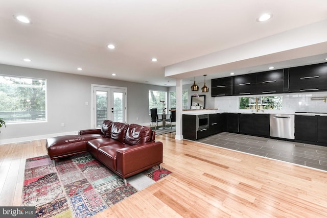 2432 S Culpeper St, Arlington, VA 22206 - living area featuring light wood-style floors, recessed lighting, and french doors