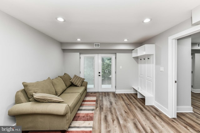 2432 S Culpeper St, Arlington, VA 22206 - living room with french doors, wood finished floors, and recessed lighting