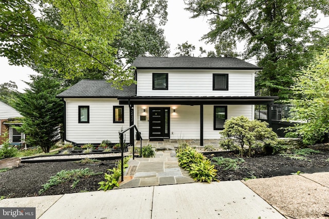 2432 S Culpeper St, Arlington, VA 22206 - view of front of home featuring a porch and roof with shingles