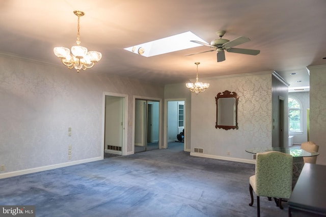 160 Fox Rd, Palmyra, PA 17078 - dining space featuring a chandelier, a skylight, ornamental molding, a ceiling fan, and carpet floors