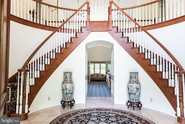 160 Fox Rd, Palmyra, PA 17078 - stairs featuring arched walkways, a high ceiling, and inlaid floor details