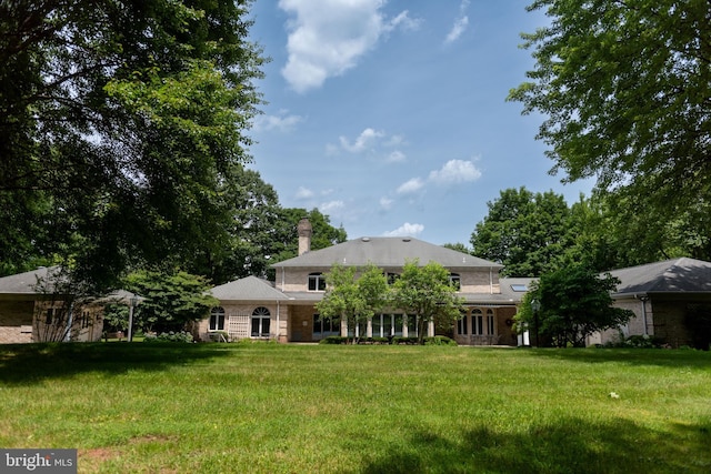 160 Fox Rd, Palmyra, PA 17078 - rear view of property with a chimney and a lawn