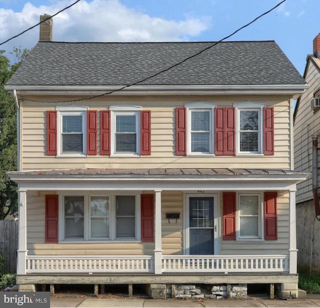 442 W Main St, Annville, PA 17003 - view of front of home featuring covered porch, a chimney, and roof with shingles
