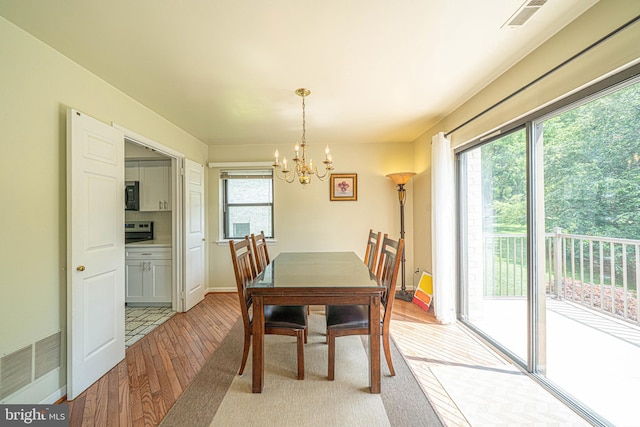 507 Foxwood Ln Unit 507, Paoli, PA 19301 - dining space featuring light wood-style floors and a chandelier