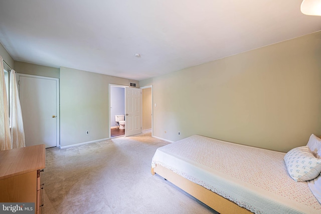 507 Foxwood Ln Unit 507, Paoli, PA 19301 - bedroom with light colored carpet and ensuite bathroom