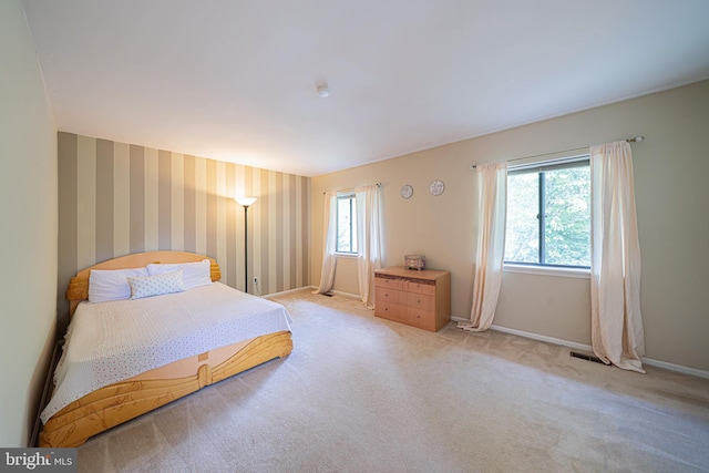 507 Foxwood Ln Unit 507, Paoli, PA 19301 - bedroom with wallpapered walls and light colored carpet