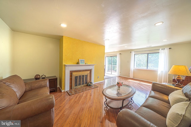 507 Foxwood Ln Unit 507, Paoli, PA 19301 - living room featuring light wood-style flooring, a tile fireplace, and recessed lighting