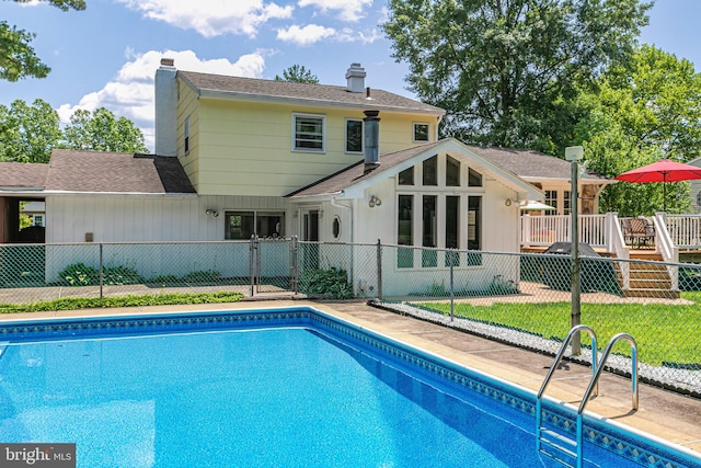 10 Camelia Ct, Lawrence Township, NJ 08648 - view of swimming pool with a gate, a patio, and a deck