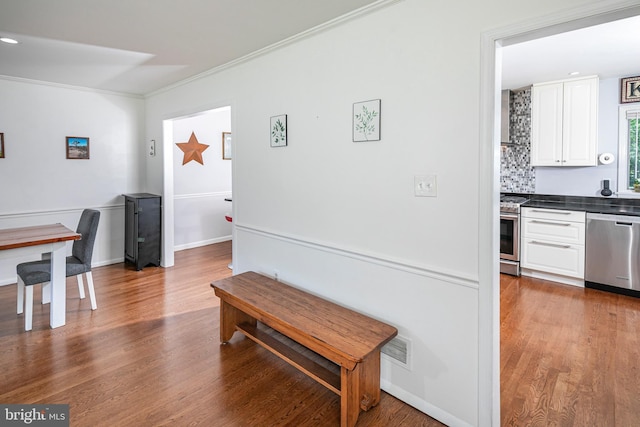10 Camelia Ct, Lawrence Township, NJ 08648 - hallway featuring crown molding and dark wood finished floors