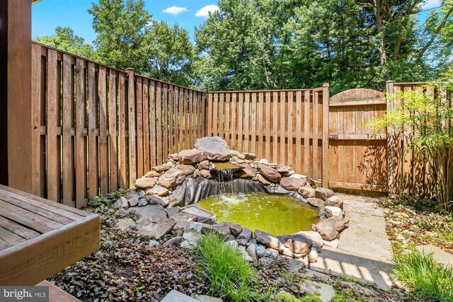 2508 Smoketree Ln, Crofton, MD 21114 - view of yard with a small pond
