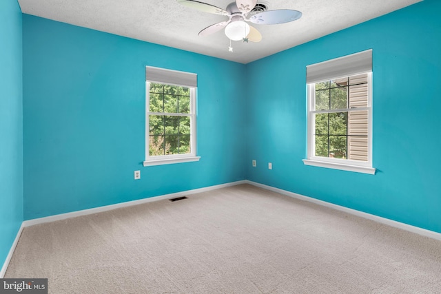 2508 Smoketree Ln, Crofton, MD 21114 - carpeted spare room with a ceiling fan and a textured ceiling
