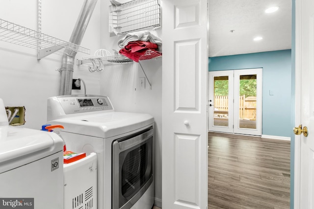 2508 Smoketree Ln, Crofton, MD 21114 - laundry room with washer and dryer, recessed lighting, wood finished floors, and french doors