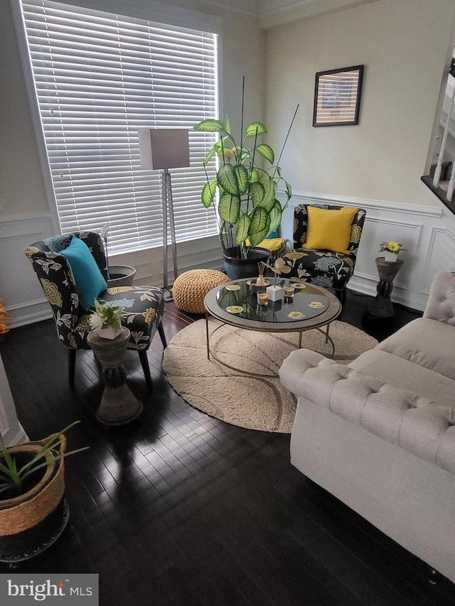 2511 Sir Michael Pl, Lanham, MD 20706 - living area featuring wood finished floors, a decorative wall, and wainscoting