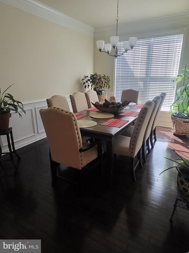 2511 Sir Michael Pl, Lanham, MD 20706 - dining area featuring a chandelier, ornamental molding, dark wood-style flooring, and wainscoting