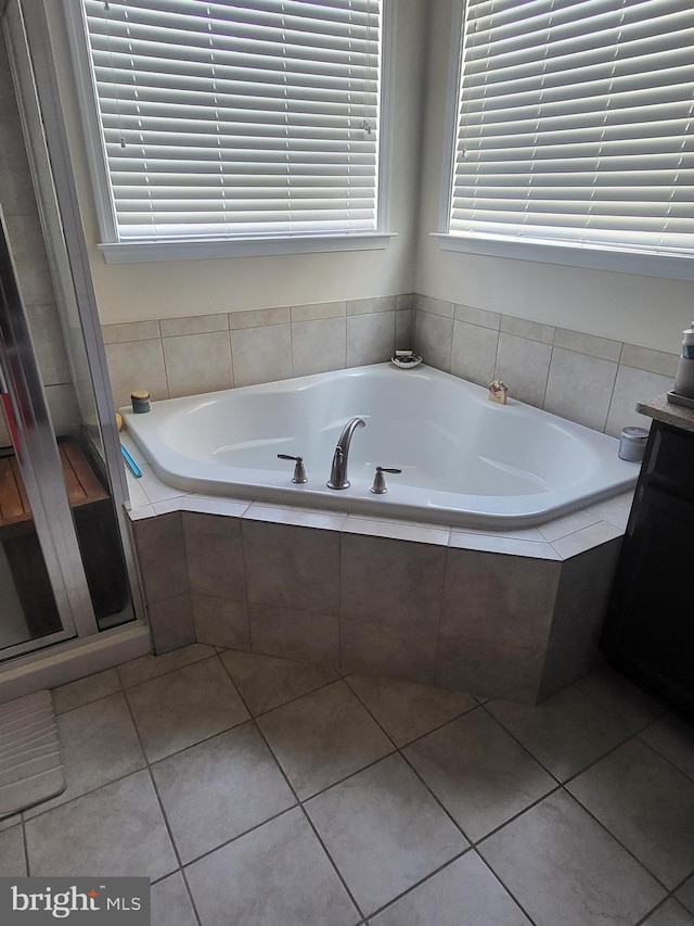 2511 Sir Michael Pl, Lanham, MD 20706 - bathroom featuring a bath, plenty of natural light, tile patterned floors, and vanity
