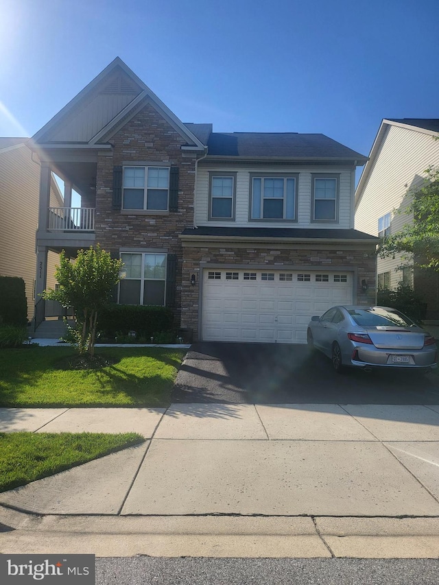 2511 Sir Michael Pl, Lanham, MD 20706 - view of front of property with an attached garage, stone siding, and concrete driveway
