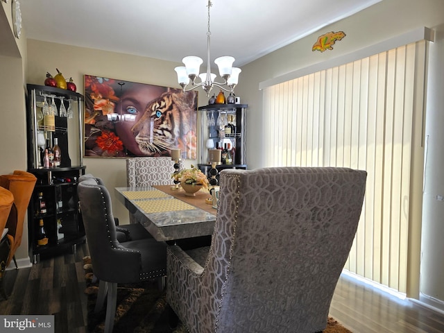 476 W Harvest Ln, Middletown, DE 19709 - dining area with a chandelier and wood finished floors