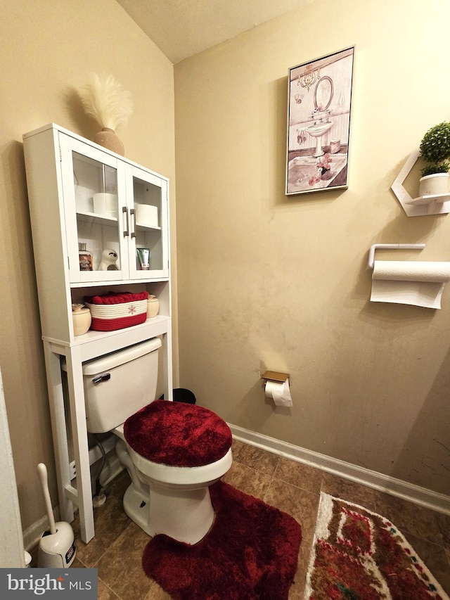 476 W Harvest Ln, Middletown, DE 19709 - bathroom featuring toilet and tile patterned flooring