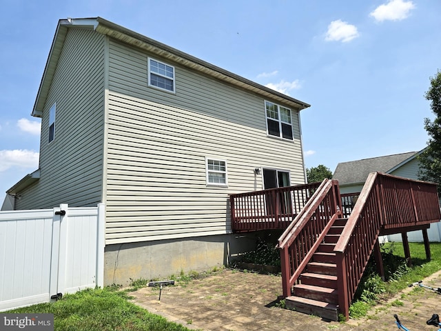 476 W Harvest Ln, Middletown, DE 19709 - rear view of property featuring a deck and stairway