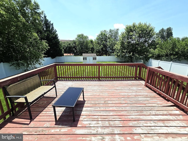 476 W Harvest Ln, Middletown, DE 19709 - wooden terrace featuring a fenced backyard and a storage shed