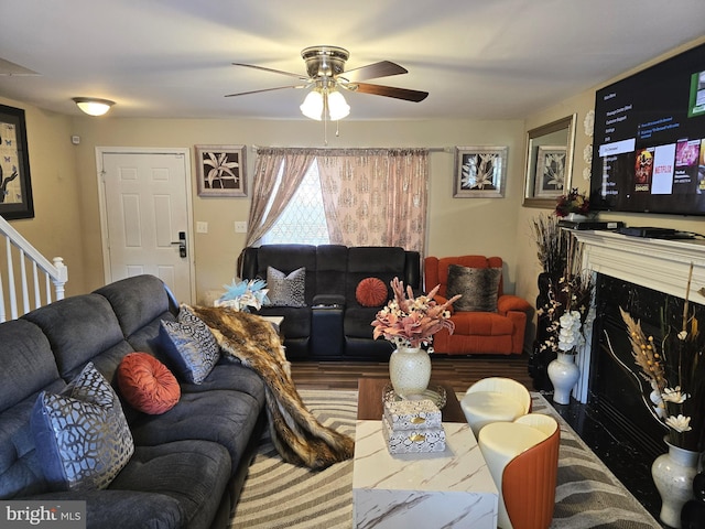 476 W Harvest Ln, Middletown, DE 19709 - living room featuring a ceiling fan, a premium fireplace, and wood finished floors
