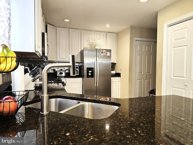 476 W Harvest Ln, Middletown, DE 19709 - kitchen with appliances with stainless steel finishes, white cabinets, recessed lighting, and dark stone countertops