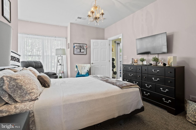 6000 Village Way Unit 308, Upper Chichester, PA 19061 - bedroom with a chandelier and carpet flooring