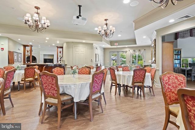 6000 Village Way Unit 308, Upper Chichester, PA 19061 - dining room featuring a chandelier, healthy amount of natural light, light wood-style flooring, ornamental molding, and recessed lighting