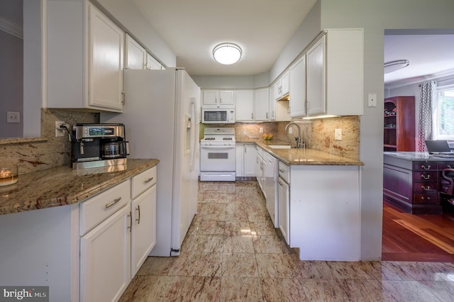 1981 Greentree Rd, Cherry Hill, NJ 08003 - kitchen featuring white appliances, white cabinets, light stone counters, and tasteful backsplash