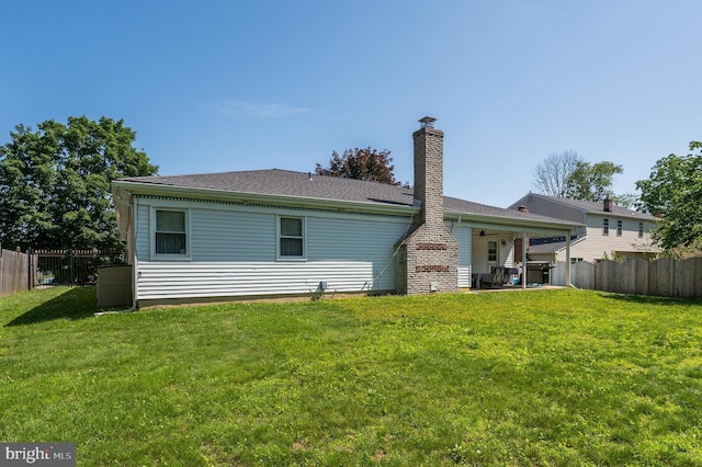 1981 Greentree Rd, Cherry Hill, NJ 08003 - back of property with a fenced backyard, ceiling fan, a patio area, and a chimney