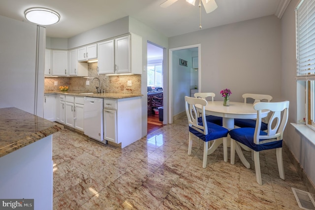 1981 Greentree Rd, Cherry Hill, NJ 08003 - kitchen with dishwasher, tasteful backsplash, white cabinetry, and plenty of natural light