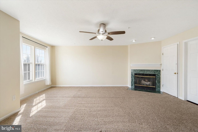 4260 Maple Path Cir Unit 15, Nottingham, MD 21236 - unfurnished living room with carpet floors, a high end fireplace, and a ceiling fan