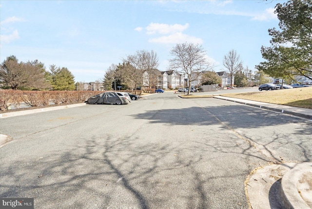 4260 Maple Path Cir Unit 15, Nottingham, MD 21236 - view of asphalt street with curbs and a residential view