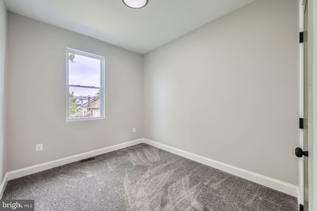 3704 Frankford Ave, Baltimore, MD 21206 - spare room with baseboards and carpet floors