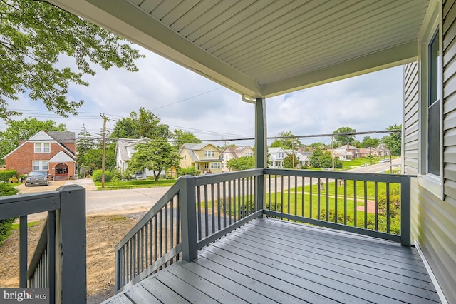 3704 Frankford Ave, Baltimore, MD 21206 - wooden porch with a residential view