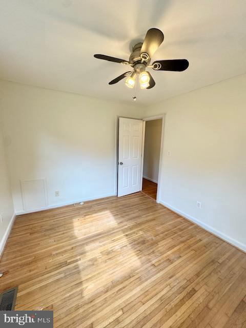 3814 Jancie Rd, Fairfax, VA 22030 - spare room with light wood-style flooring and ceiling fan