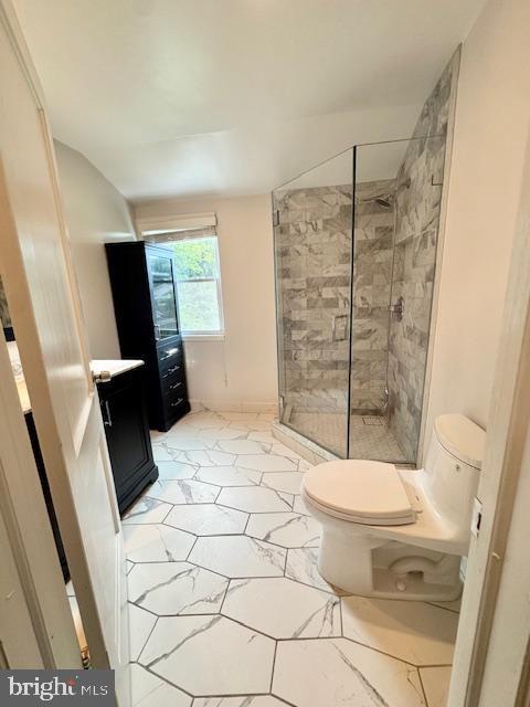 3814 Jancie Rd, Fairfax, VA 22030 - full bath featuring a stall shower, vanity, and marble finish floors