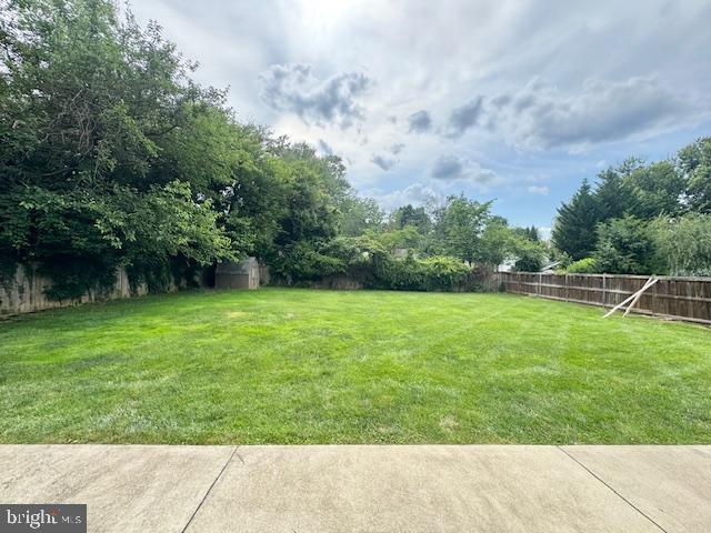 3814 Jancie Rd, Fairfax, VA 22030 - fenced backyard featuring view of scattered trees